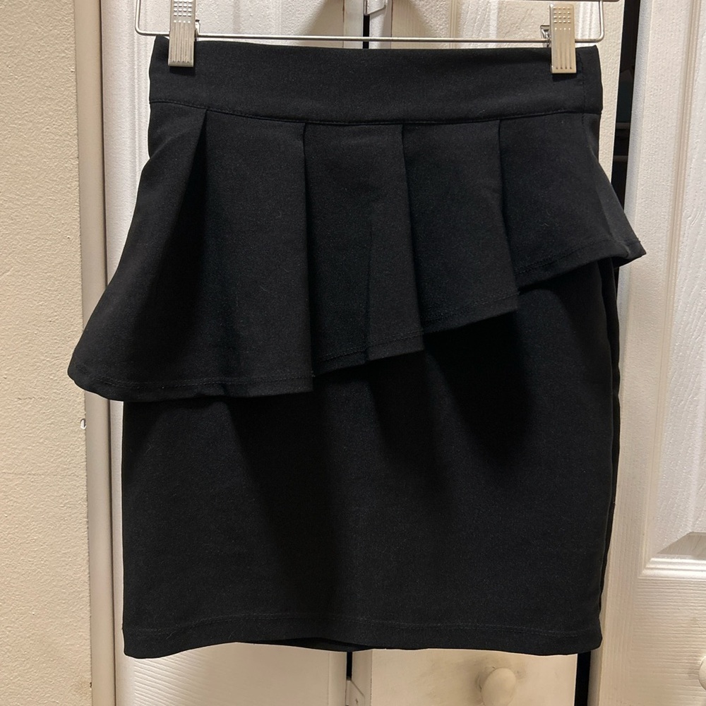 Charlotte Russe Black Peplum Mini Skirt. Slight stretch, excellent condition!